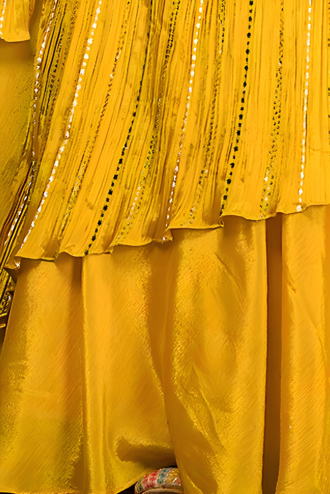 Stunning yellow chinon lehenga choli, crafted for women seeking elegance at weddings and special celebrations.