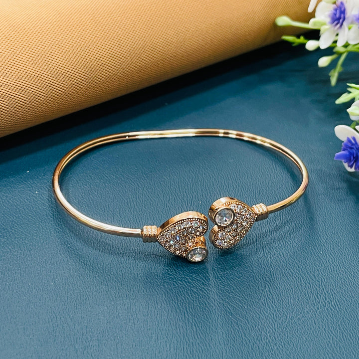 Sophisticated rose gold bracelet with a crystal stone, adding a touch of sparkle.