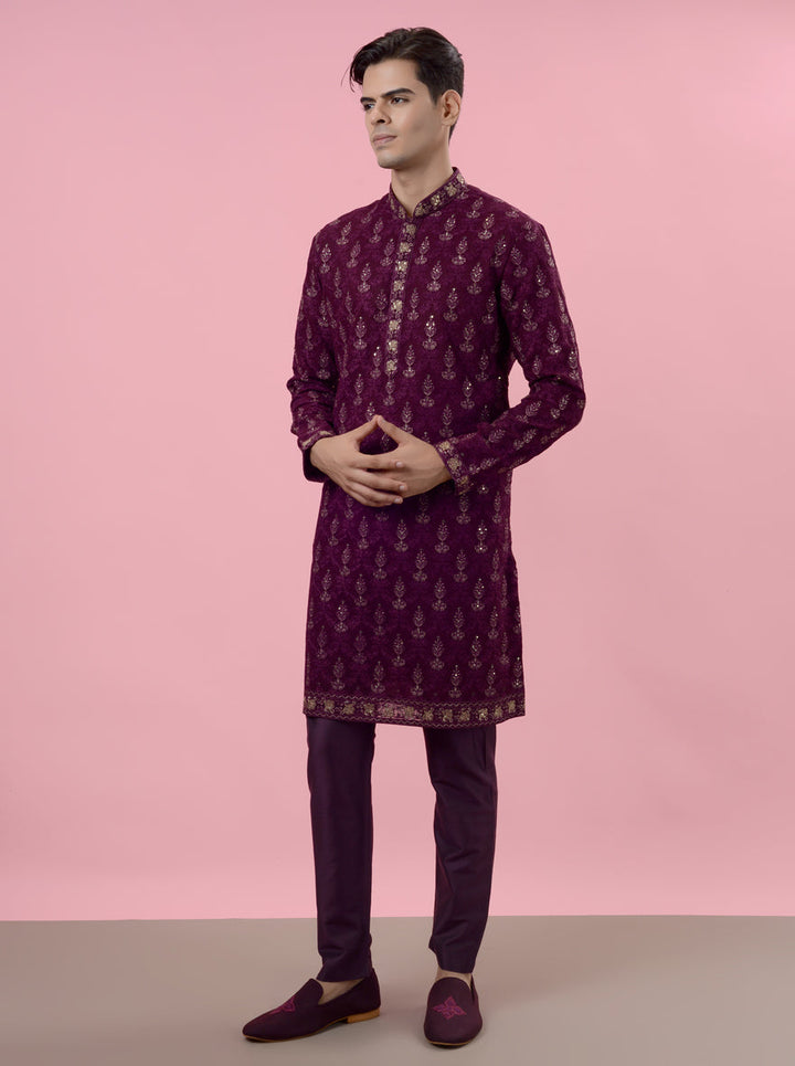 Step into sophistication with our exquisite wine kurta pajama designed for modern men.