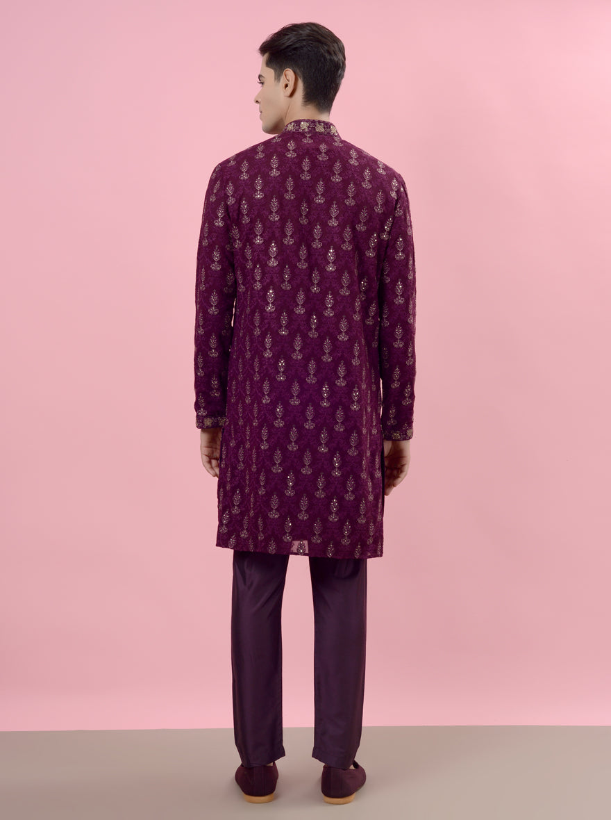 The elegant embroidery on this wine kurta pajama enhances its appeal for special occasions.