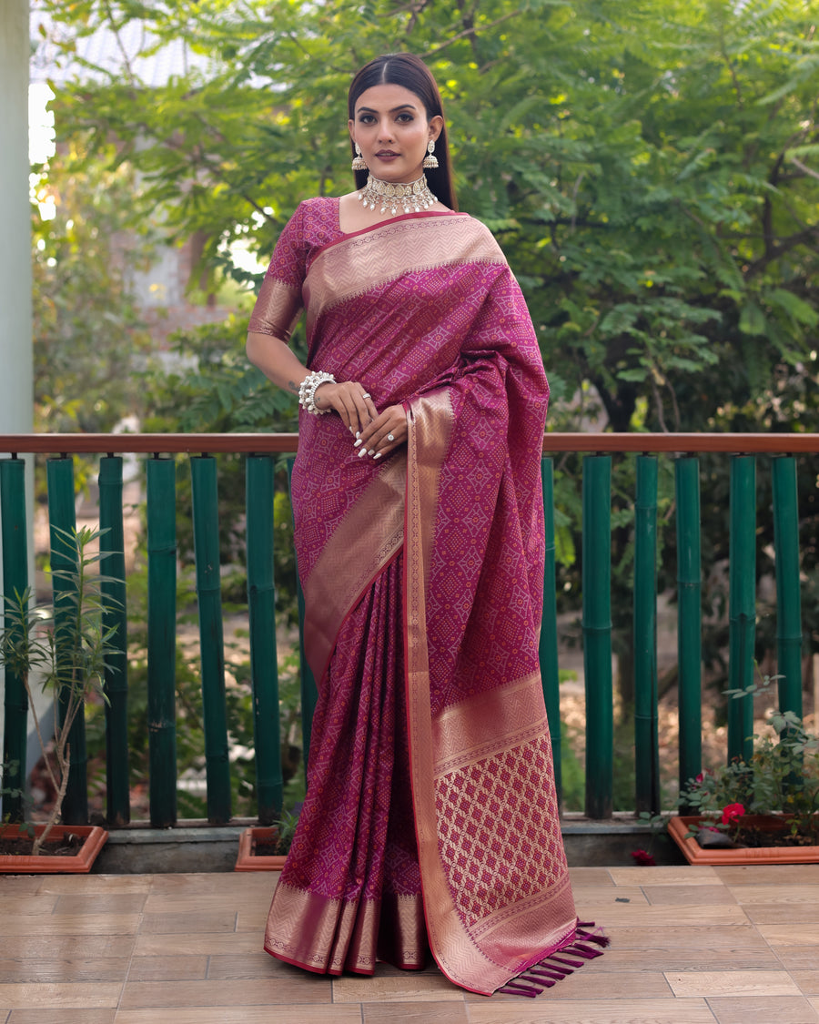 Stunning maroon Bandhej silk saree with contrast zari borders, offering comfort and style for special events.