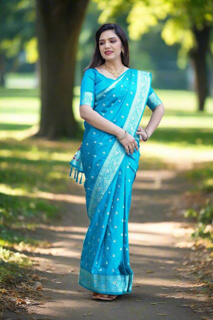 Classic sky-blue Kanjivaram silk saree with radiant shine and beautiful weaving, ideal for luxurious celebrations.