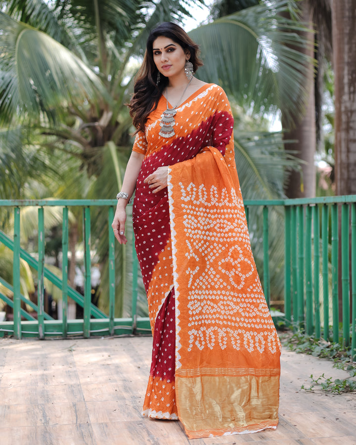 Elegant Maroon Bandhej Silk Drapes with Zari Tissue Pallu and blouse piece for a premium ethnic look at special events.