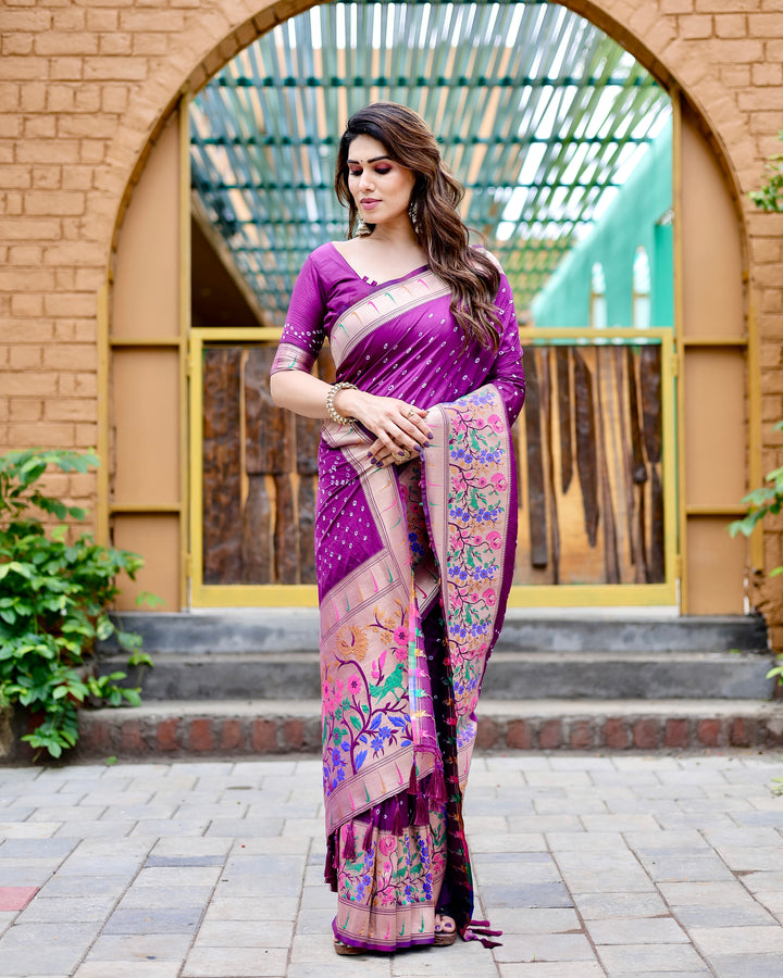 Dark purple Bandhej silk saree with Paithani border and intricate zari pallu, perfect for making a stylish statement.