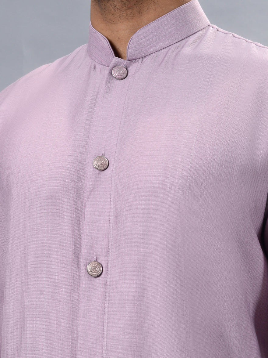 Comfortable pink kurta pajama for men, designed for formal and festive wear.