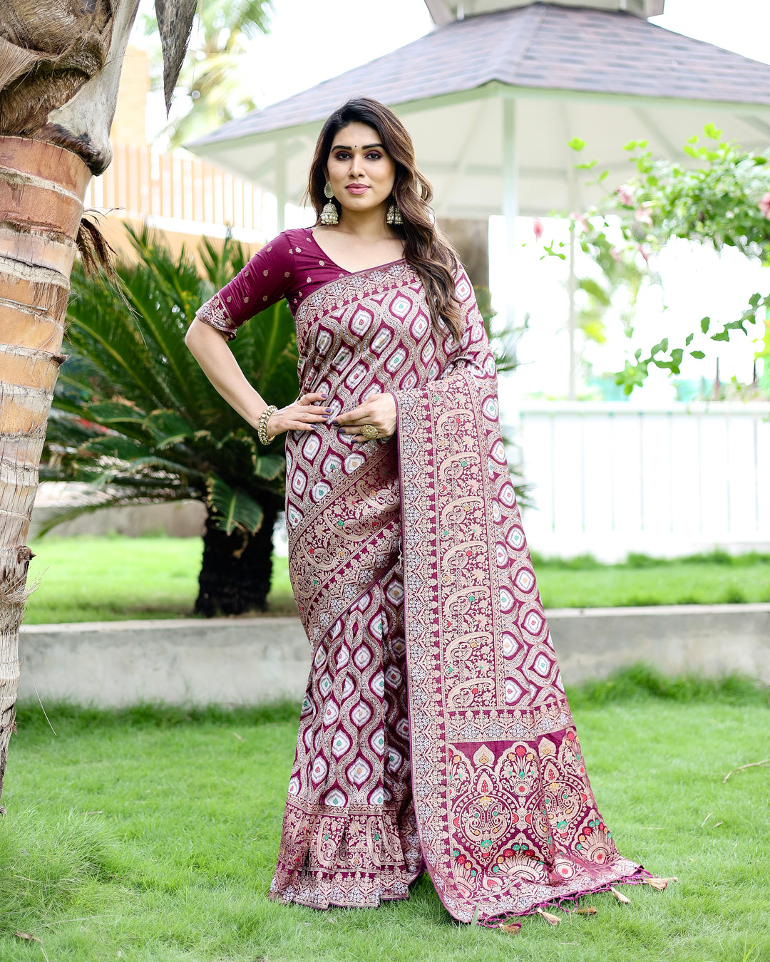 Traditional red Kanjivaram Pattu Silk Saree with luxurious zari work & embossed texture, perfect for USA brides.