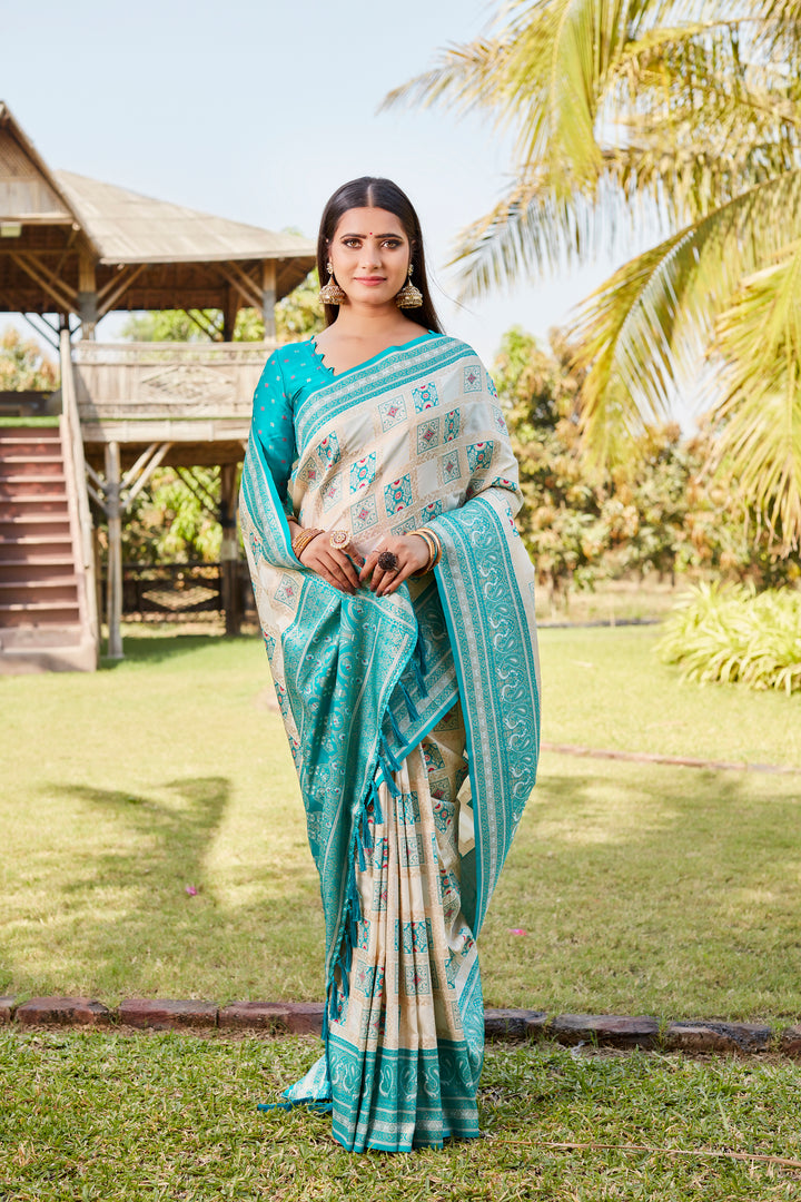 Sky-blue Traditional Kanjivaram soft silk saree with designer borders and intricate design.