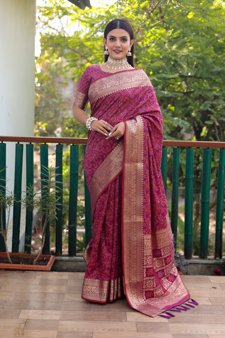 Bright red Pure Patola Silk Saree featuring intricate Zari & Kanchi borders for elegant USA occasions.