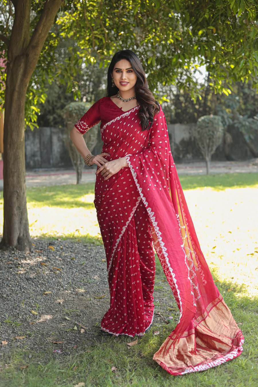 Premium Red Bandhej Silk Saree with beautiful Zari weaving and Pallu, adding luxury to your celebrations.