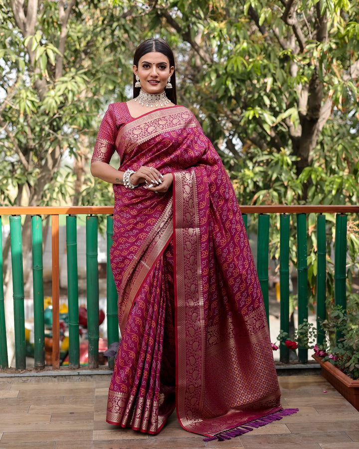 Timeless blue Bandhej Patola saree with intricate zari work and Kanchi borders, ideal for cultural gatherings.