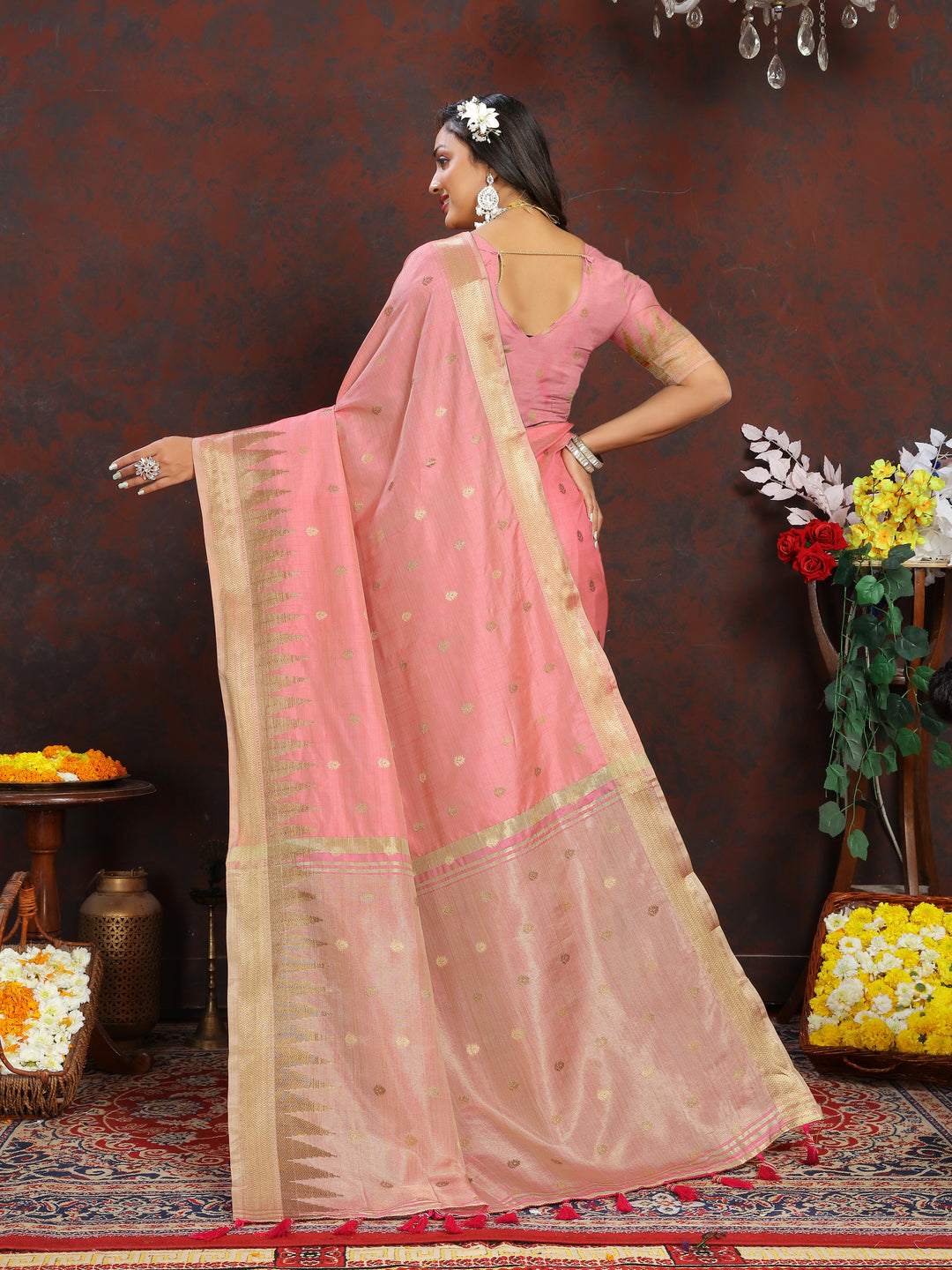 Stunning Peach Katan Silk Saree with detailed zari weaving and pallu tassels, perfect for bridal wear.