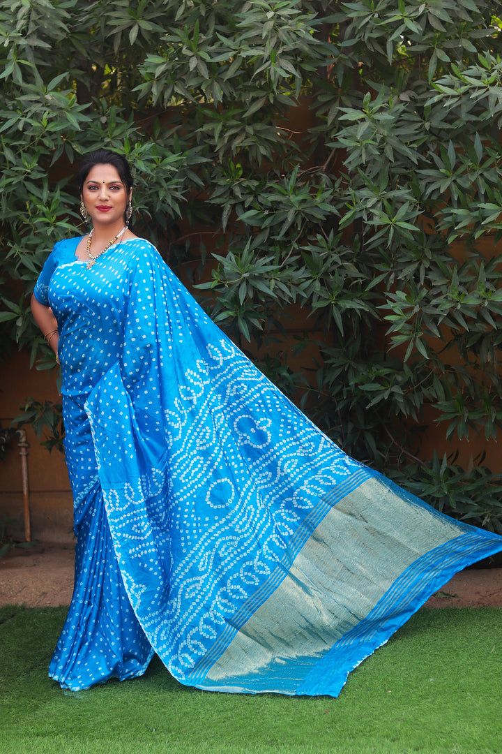 Sky blue traditional Bandhej saree in luxurious silk, designed with Zari Weaving Pallu, ideal for special occasions in the USA.