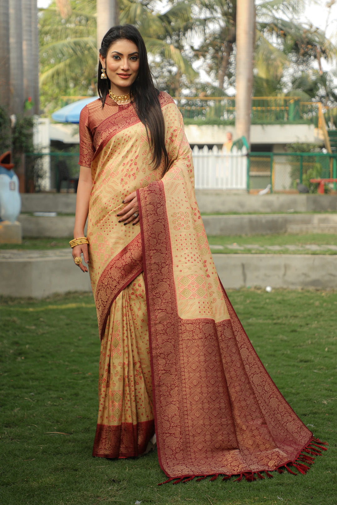 Cream Kanjivaram silk saree with vibrant colors and intricate design for stunning wedding looks.