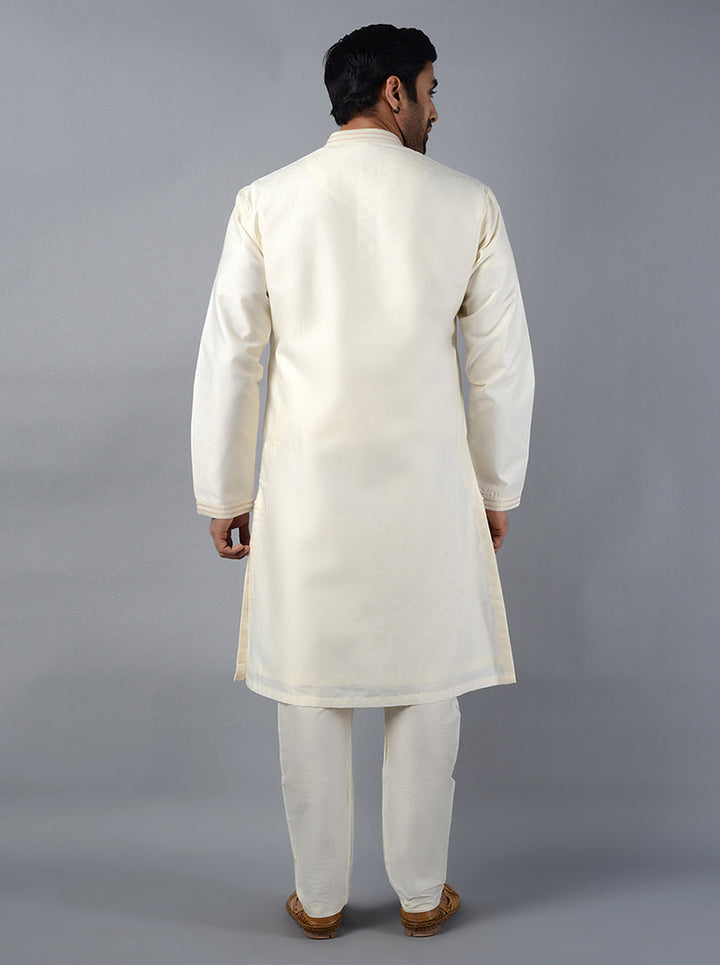 Experience sophistication with our stylish cream kurta set, tailored for modern events.