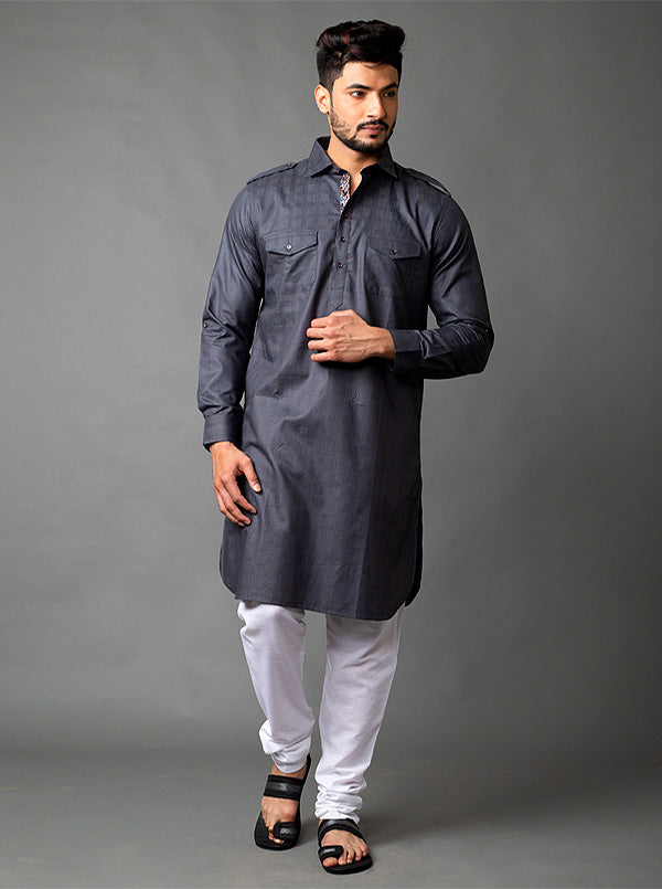 Modern twist on tradition with this stylish gray Pathani kurta, crafted for men who appreciate classic elegance.