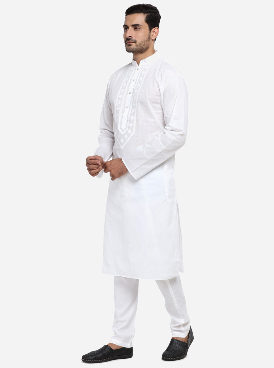 Elevate your ethnic collection with this elegant self-design white kurta set.