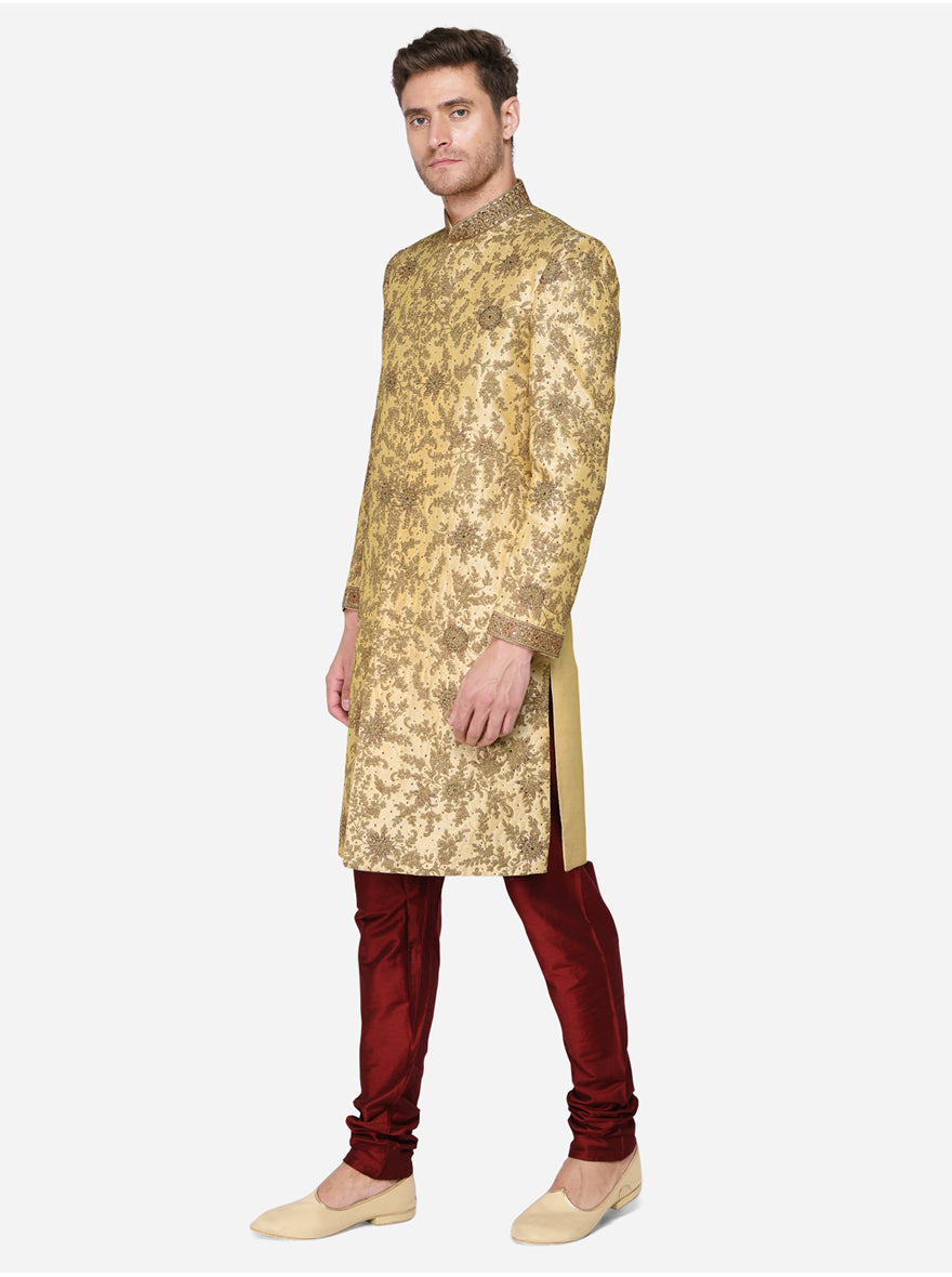 Look distinguished on your special day with our beige and golden sherwani, tailored for comfort.