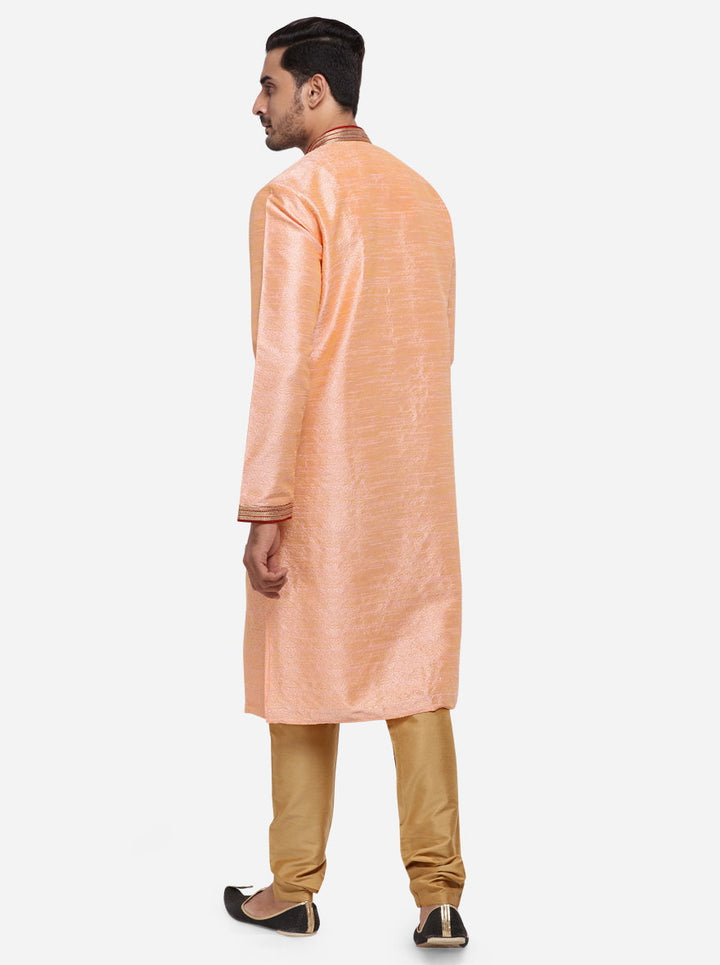 Experience elegance and comfort with this self-textured peach kurta set, ideal for American audiences.