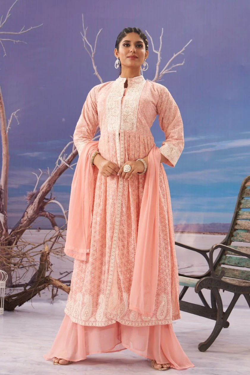 Peach georgette peplum lehenga with skirt featuring intricate gota work embellishments, perfect for festive occasions.