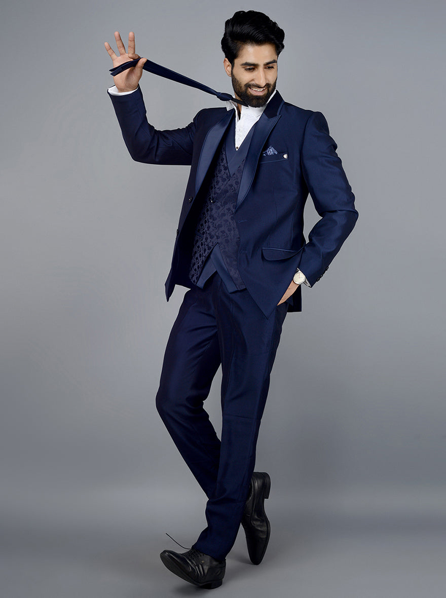 Men's navy blue tuxedo, designed for formal events, offering a sophisticated look for any elegant occasion.