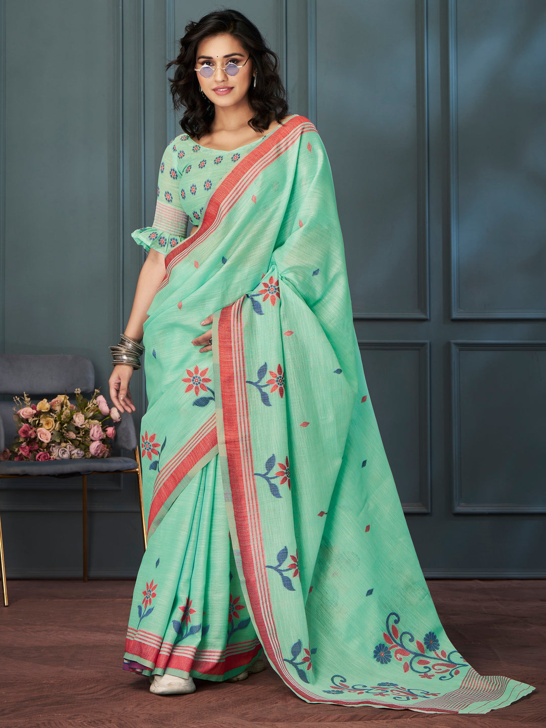 Green linen saree crafted for elegance and style.