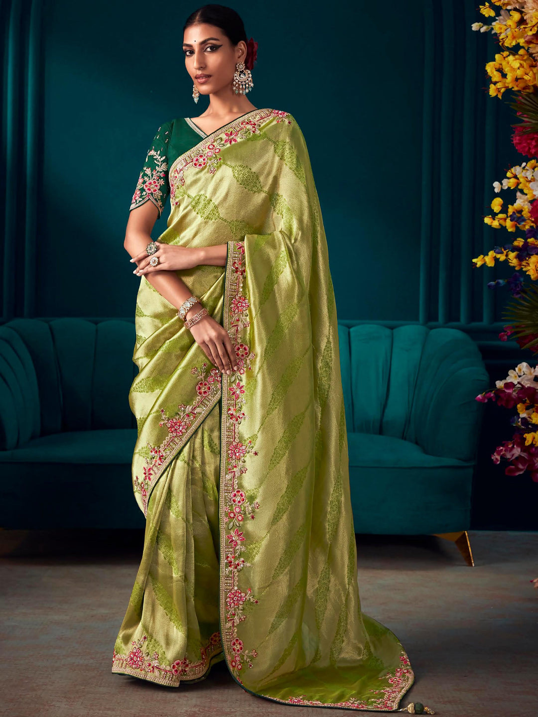 Green silk saree crafted for elegance and style.