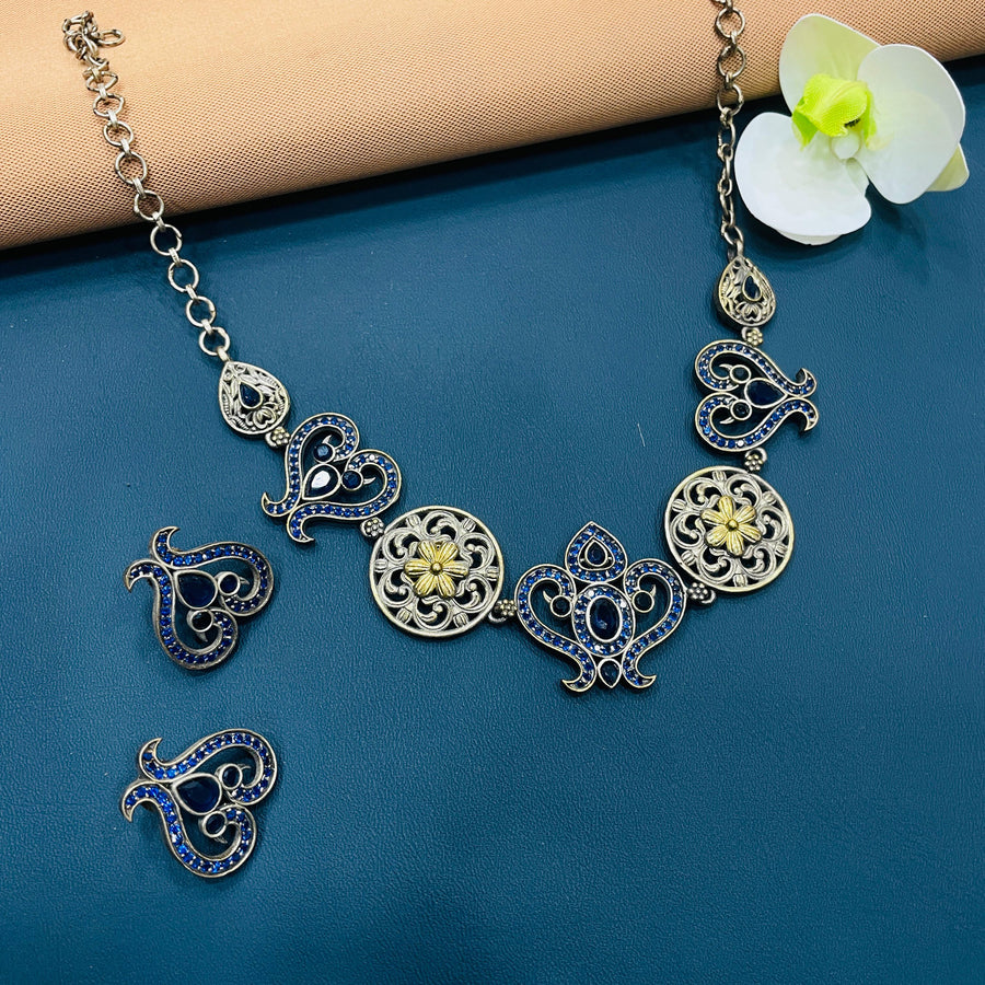 Timeless bridal necklace set in intricate German silver, designed for creating stunning looks at parties.