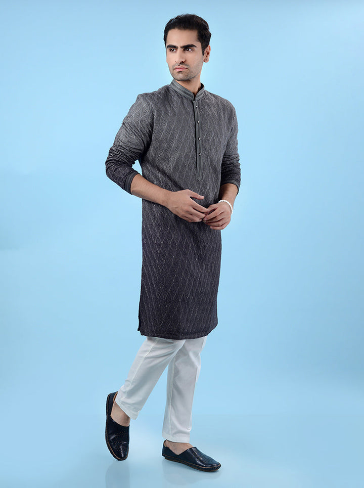 Men's grey silk kurta pajama set, crafted with fine embroidery for a classy traditional style.