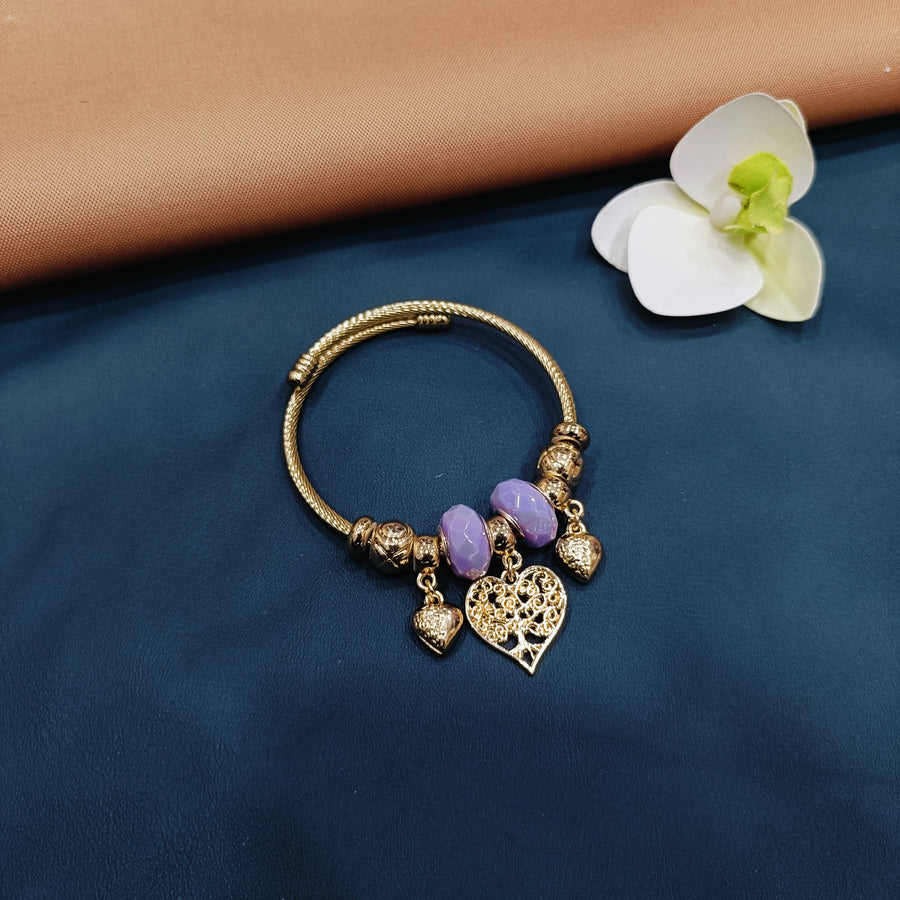 Feminine Pandora bracelet with floral-themed charms, a lovely gift for any occasion.