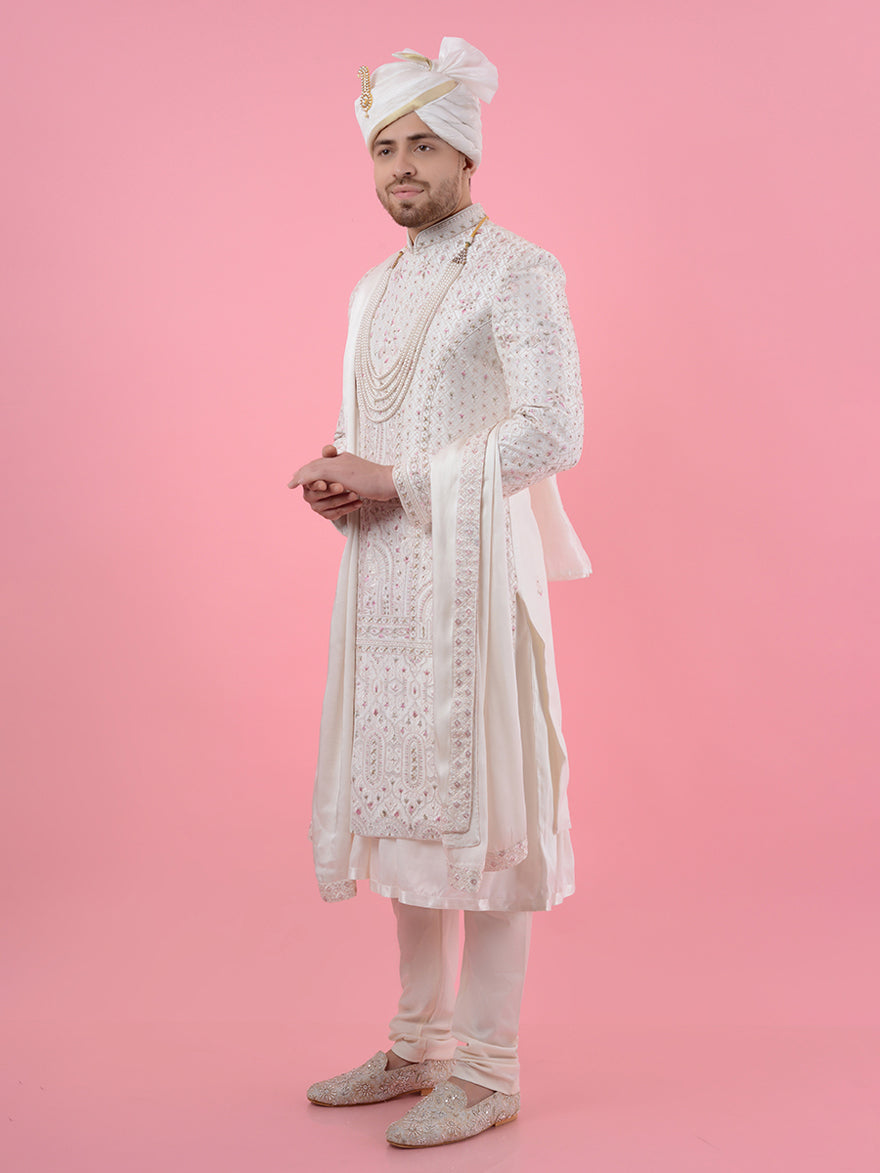 Experience the perfect combination of luxury and tradition with this Cream Silk Blend Embroidered Sherwani, tailored for comfort and detailed with exquisite embroidery for special occasions in the USA.