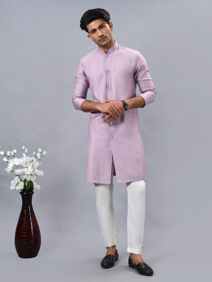 Traditional pink kurta pajama set for men, perfect for ethnic wear and cultural events.