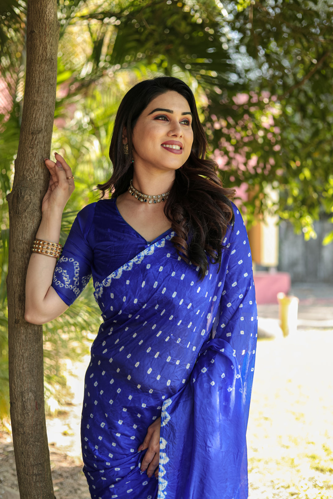 Blue Bandhej Silk Saree with stunning Zari weaving and Pallu, perfect for elegant occasions.