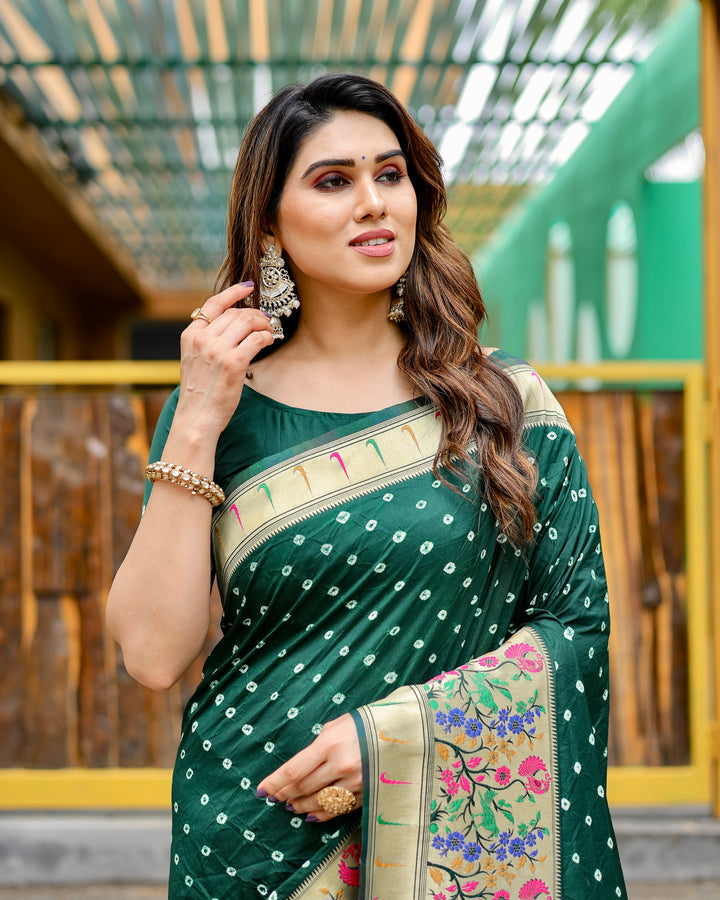 Dark green Bandhej Paithani silk saree with rich zari work and tassel-adorned Paithani pallu, designed for elegant occasions.