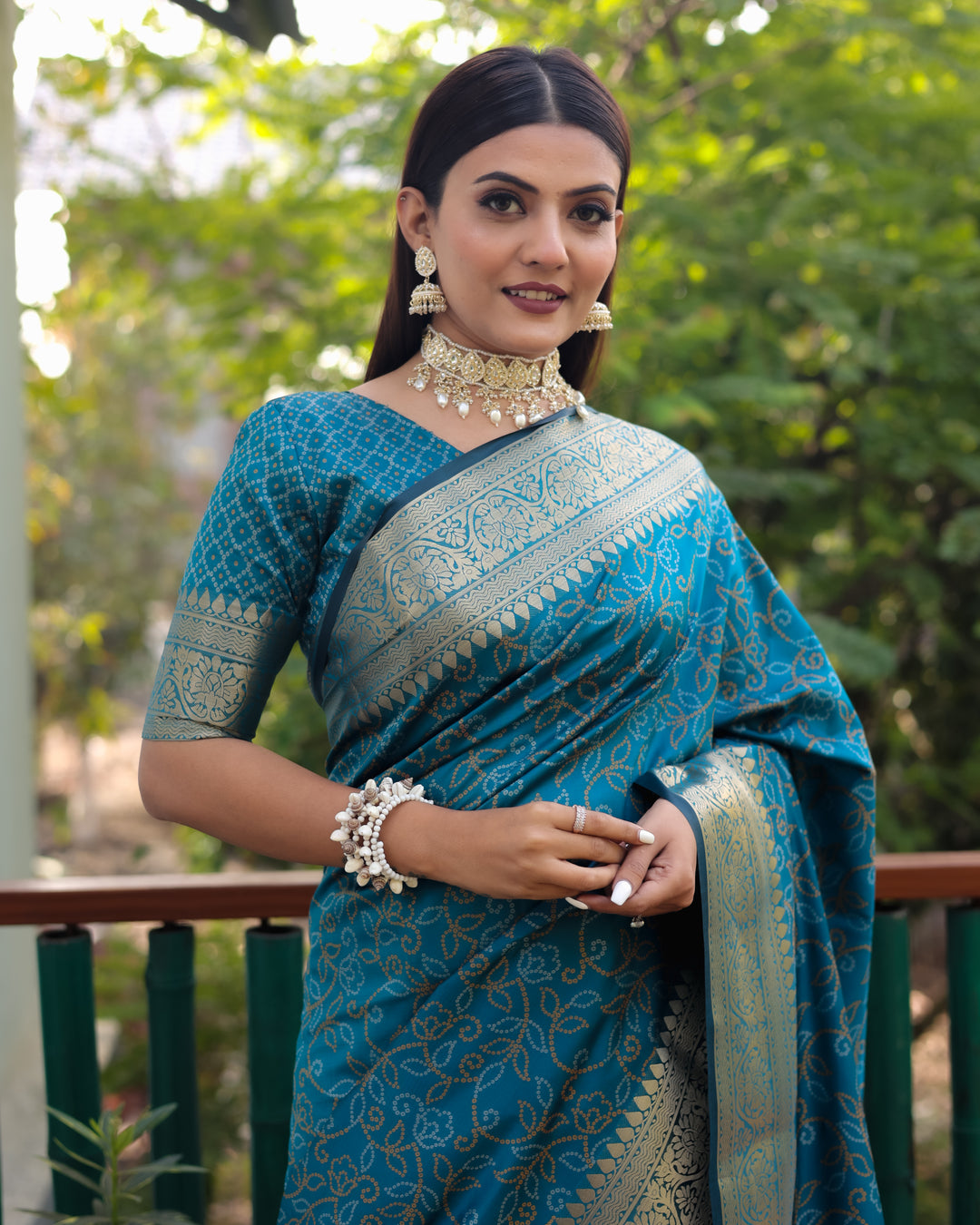 Blue Pure Handloom Bandhej Patola Silk Saree with intricate Zari and Kanchi borders, perfect for USA weddings.