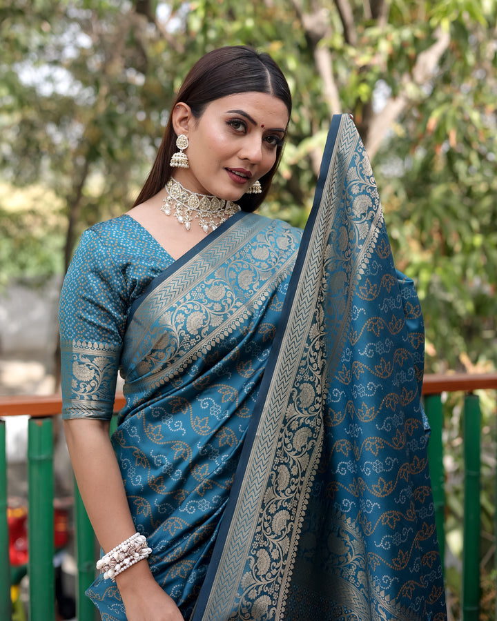 Elegant maroon Bandhej Patola silk saree with intricate zari work and Kanchi borders, perfect for wedding functions.