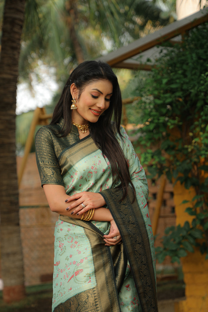 Stunning Kanjivaram saree in Mint green, designed to enhance your festive wardrobe with a beautiful shine.