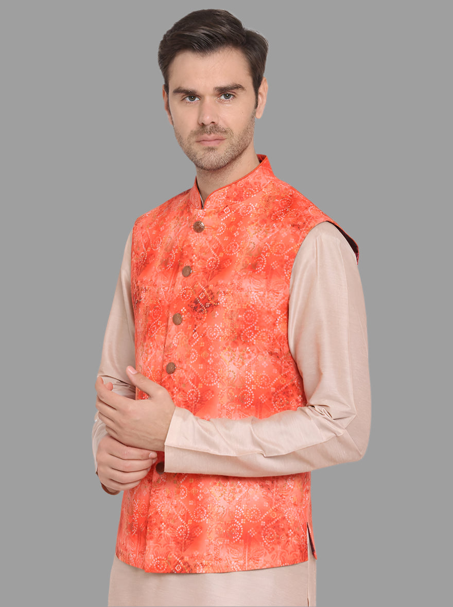 Exquisite bandhani print on an orange waistcoat, perfect for adding a touch of luxury to any outfit.