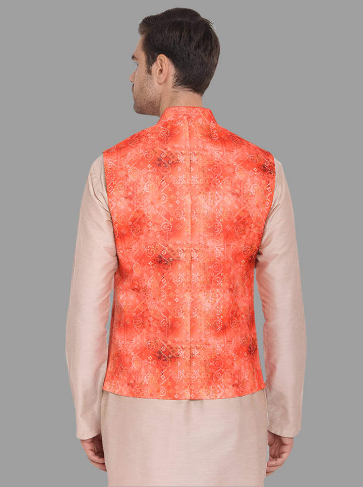 Elegant orange waistcoat featuring intricate bandhani prints, perfect for festive and formal occasions.