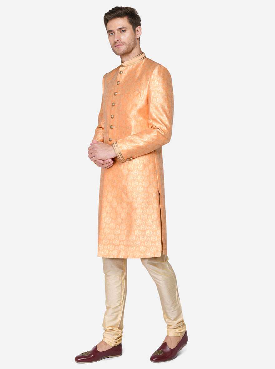 This traditional Indian Sherwani features a sleek mandarin collar and stylish side slits for a polished appearance.