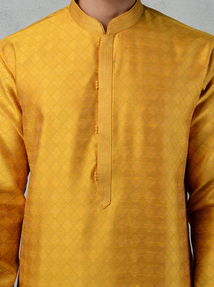 Contemporary golden kurta set with potli buttons, ideal for USA festive and casual events.