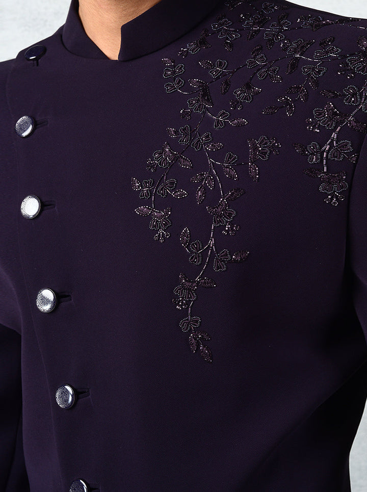 Modern purple Indo-Western dress with unique angrakha cut and hand embroidery.