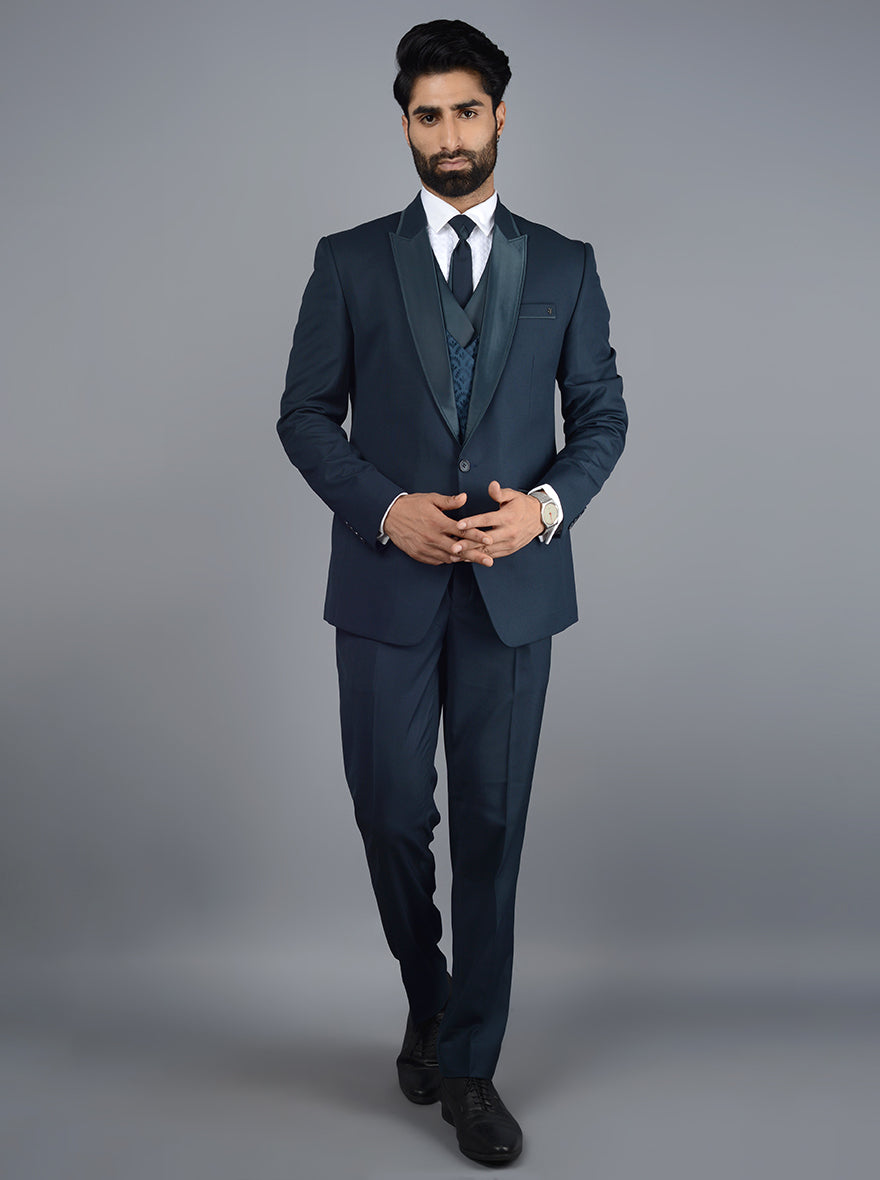 Stylish teal blue suit for men, perfect for weddings and proms, combining elegance with modern design.