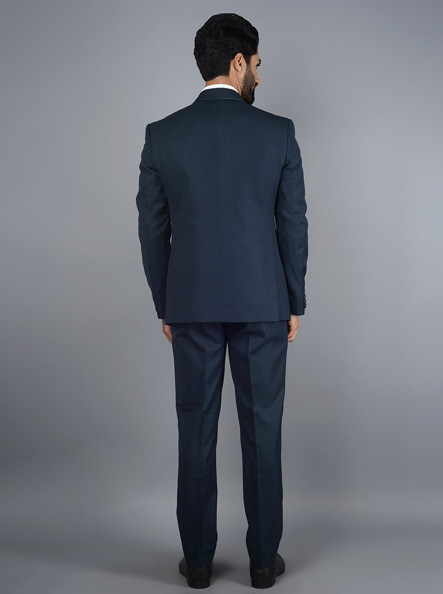 Elegant teal blue suit for men, ideal for special occasions, offering a unique twist on classic formal wear.