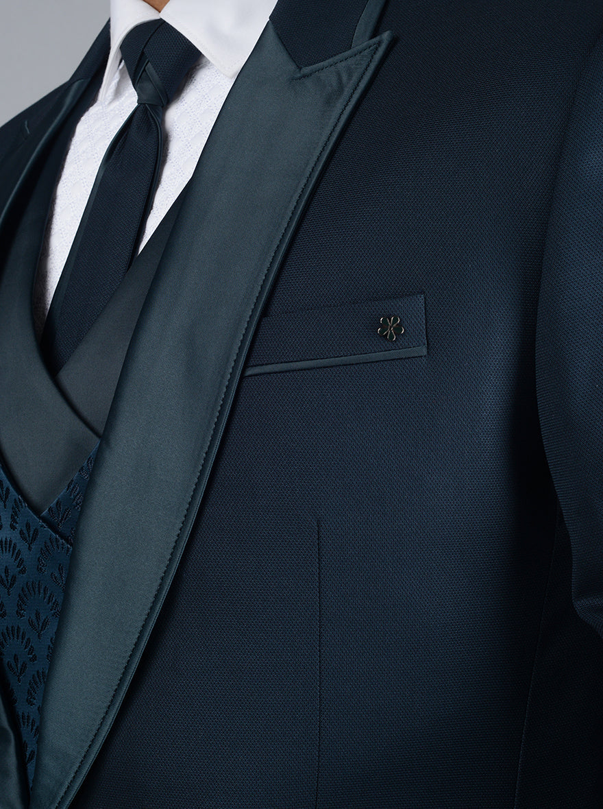 Contemporary teal blue suit, perfect for men seeking a stylish look for formal gatherings and celebrations.