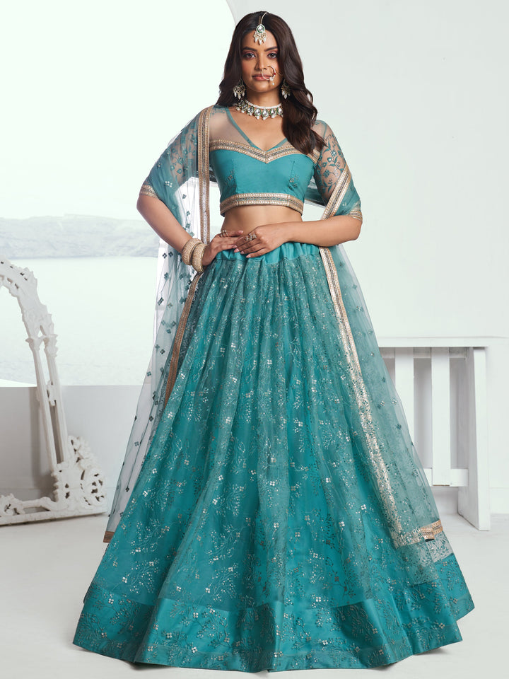 Beautiful Teal Green Embroidered Net Wedding Wear Lehenga Choli