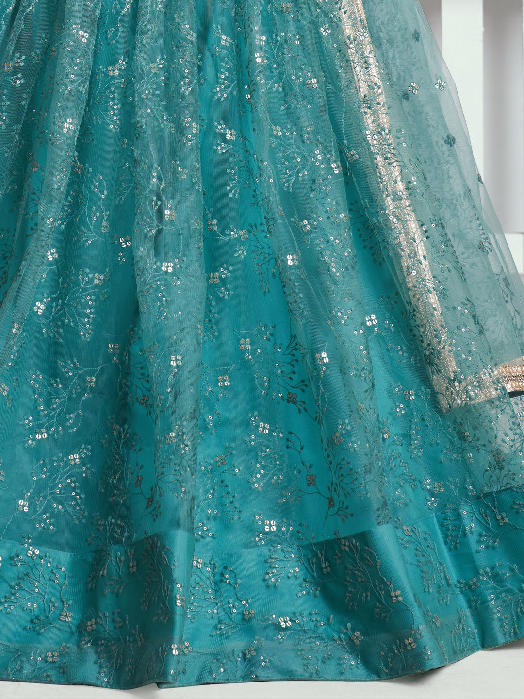 Beautiful Teal Green Embroidered Net Wedding Wear Lehenga Choli