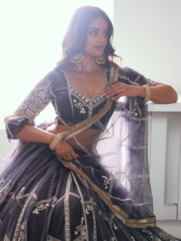 Charming Dark Grey Embroidered Net Reception Wear Lehenga Choli