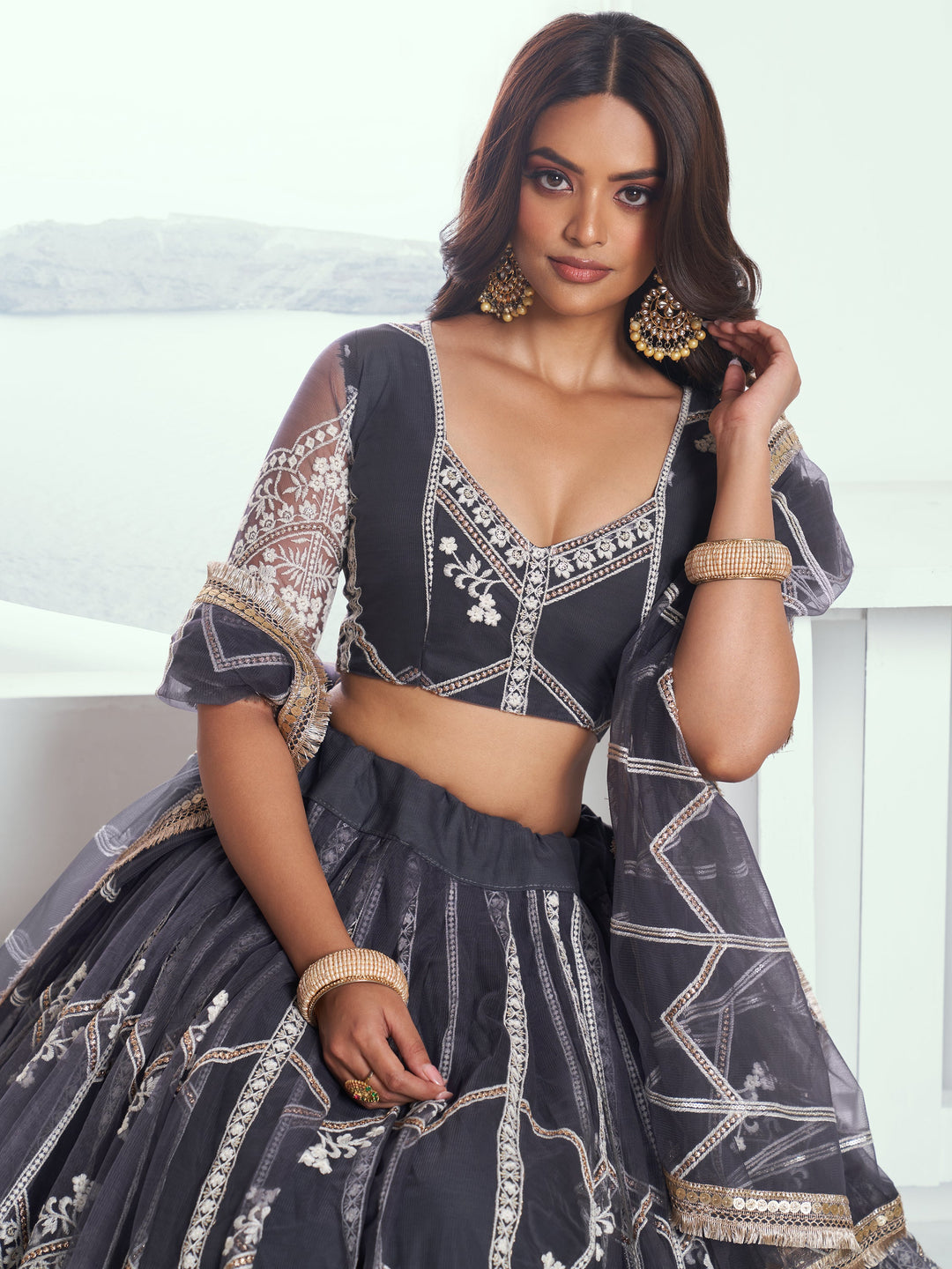 Charming Dark Grey Embroidered Net Reception Wear Lehenga Choli