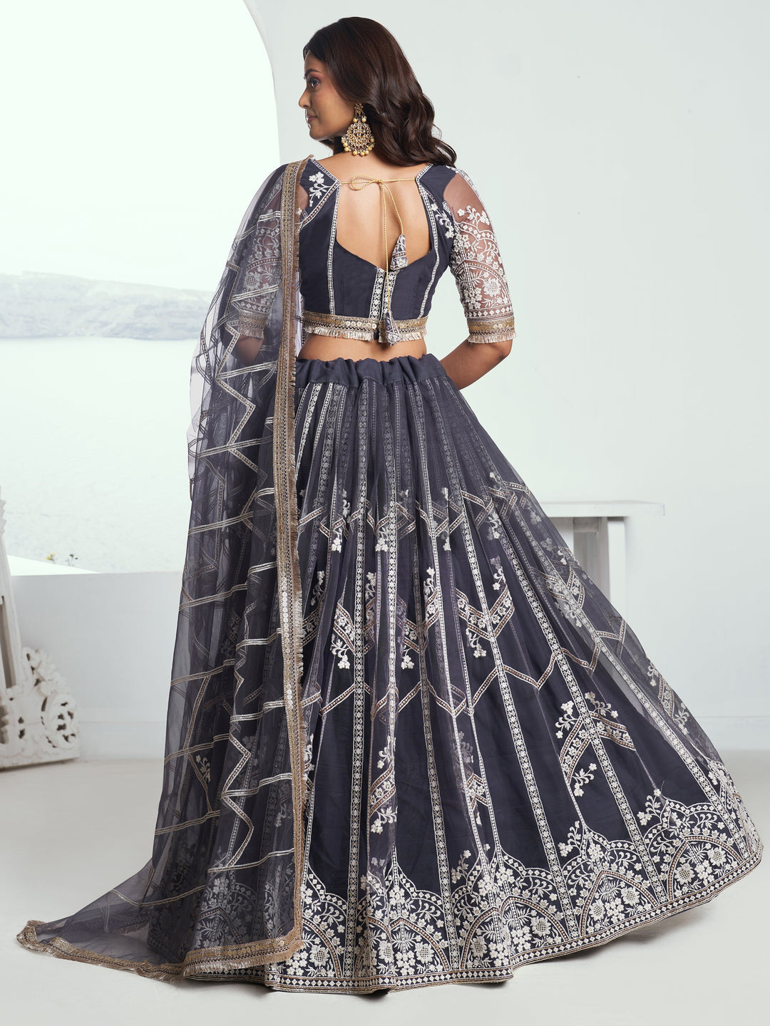 Charming Dark Grey Embroidered Net Reception Wear Lehenga Choli