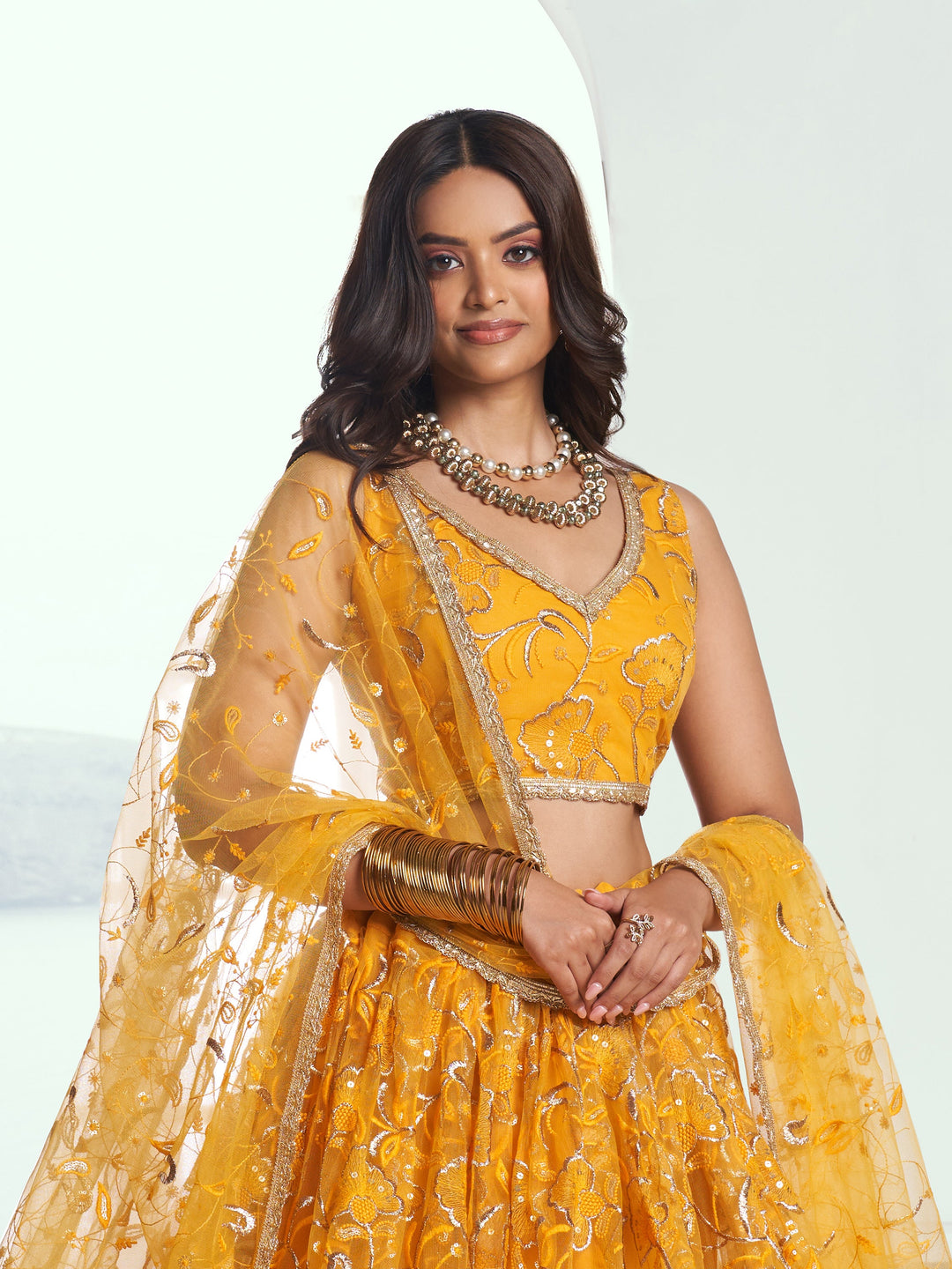 Attractive Yellow Embroidered Net Wedding Lehenga Choli With Dupatta